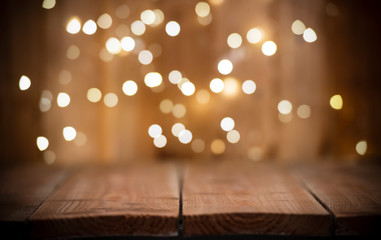 Christmas Bokeh background with empty wooden