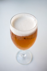 Beer cup close up on white background