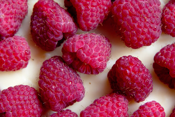 raspberries on cake