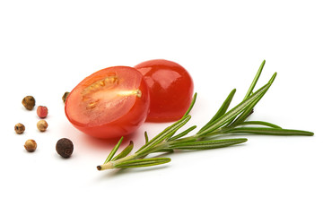 Juicy Fresh Tomato with herbs and spices, isolated on a white background. Close-up.