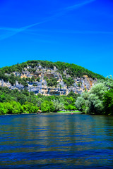 A view up the Dordogne River near the medieval village of La Roque Gageac in Aquitaine, France