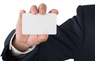 Businessman holding a blank card