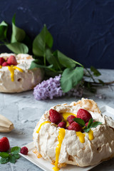 Pavlova cake with strawberry and citrus cake. Strawberry dessert. Cake with berries. Orange curd. Summer cake. Crusty dessert. Meringue.