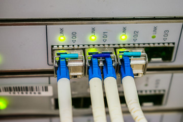  10G main server interfaces. Front panel of the central data center router. Modern high-speed...