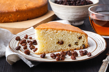 Homemade christmas cake with dried fruits and nuts on rustic wooden table