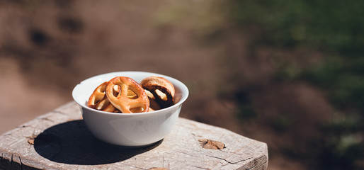 organic bagel, crispy cracknel or pastry pretzel , snack appetizer made in rustic bakery served on...