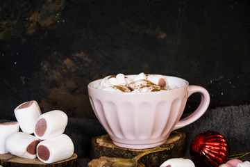 Good New Year spirit. Coffee with marshmallows and cinnamon. Pink mug. Cooking yourself. Photos for coffee. Home comfort. New Year. Christmas time. Winter mood.