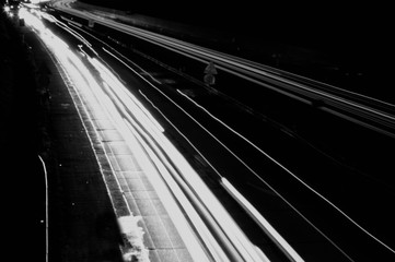 Car light lines on a higway during trafic jam at night