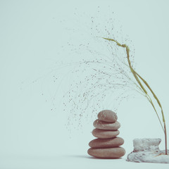 Spa still life with stacked of stone with a beautiful branch