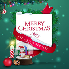 Christmas greeting card template with snow globe and candle. Red ribbon around a piece of paper with Christmas tree branches