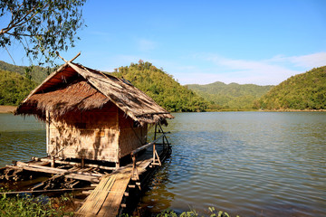 Fototapeta na wymiar Bamboo rafts on the shore of Hoob Khao Wong Reservoir or Pang Oung of Suphan, Suphanburi province, Thailand