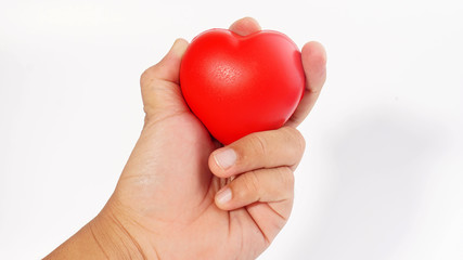 Hand holding a heart shape.