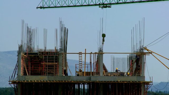 Workers on construction site time lapse