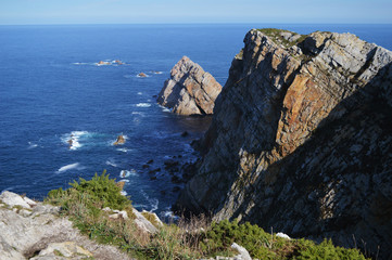 Horizon of the Cantabrian Sea and palaeozoic rock formations from the Cabo de Penas in Asturias, Spain