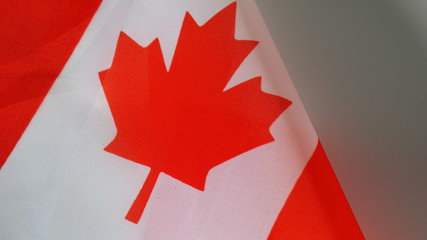 Macro closeup shot of a red white canadian flag