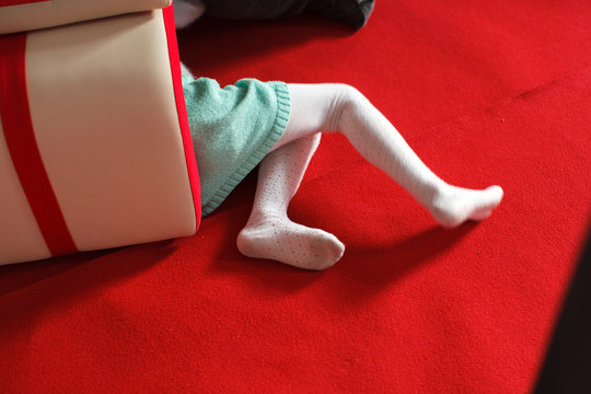 Children's Feet On The Red Carpet