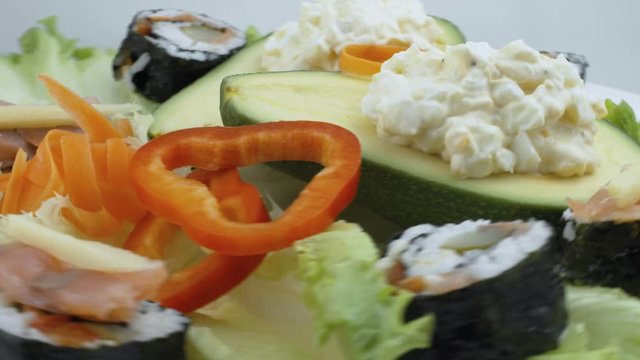 Stuffed Avocadoes, Suchi and Salad Toast Spinning Close Up