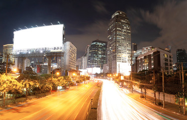 Fototapeta na wymiar Motion light traffic on highway in City 