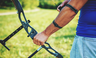 Archer. Sportsman practicing archery. Sport, recreation concept
