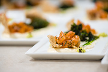 Salmon with vegetables in creamy caviar sauce