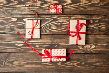 Fototapeta premium Christmas gifts on a wooden table