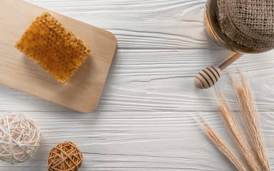 Fototapeta na wymiar Flat lay honey and natural honeycomb