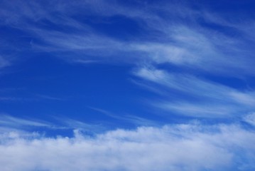 Naklejka na ściany i meble many white small clouds on blue sky