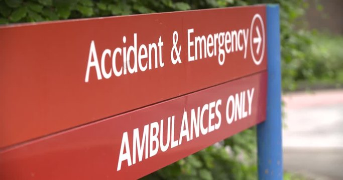 4K Healthcare: Focus Pull Into Hospital Sign For Accident And Emergency And Ambulances Only.