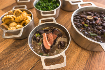 Dishes that are part of the traditional feijoada, typical Brazilian food