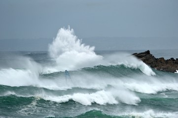 waves crashing on rocks