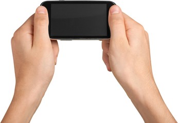 Person holding a phone horizontally with a blank screen