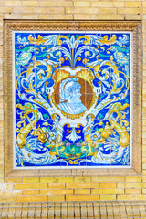 Azuelo picture on a house wall in Seville, Spain