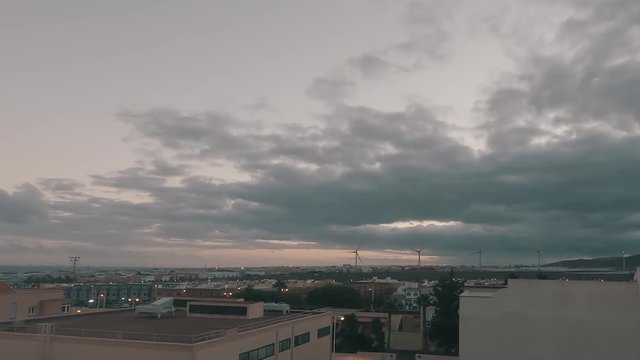 Sunset time Lapse with beautiful clouds on Cruce de Arinaga, Ag&radic;&ordm;imes, Gran Canaria, Spain. Time lapse with zoom in.