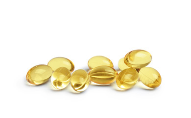 Cod liver oil pills on white background