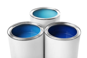 Open paint cans on white background, closeup