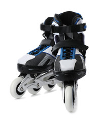 Pair of inline roller skates on white background