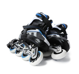 Pair of inline roller skates on white background