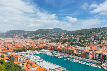 Fototapeta na wymiar View of the port of Nice, France, with boats and houses