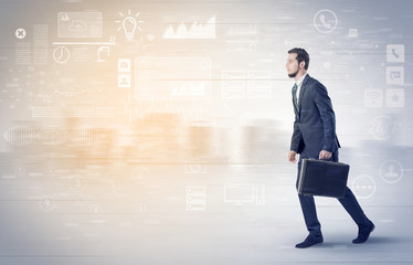 Handsome businessman walking in suit with briefcase on his hand and database concept around
