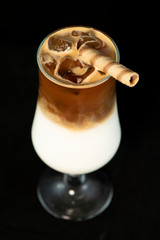 Alcoholic coffee cocktail with coffee liqueur and milk