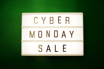 cyber monday sale flat lay top view on green background