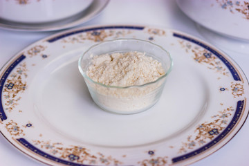 Some flour in a glass container
