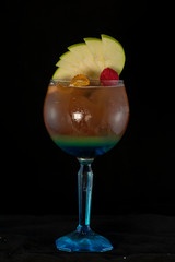 Special Iced Tea Cocktail with coke, light rum, blue curacao and sweet and sour