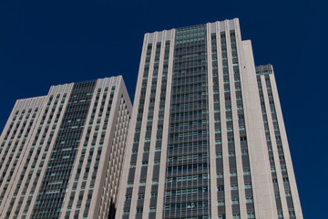 Fototapeta na wymiar Tokyo, Japan - November 3, 2016. Modern skyscraper office buildings in Tokyo City in Japan.