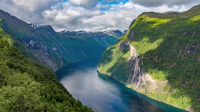 Timelapse of boats on Geiranger fjord in front of Seven Sisters waterfall