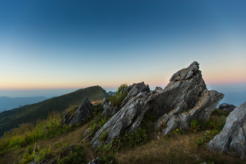 The rock view point Sunset of travel place at Doi Pha Tang, Chiang Rai's Hidden Paradise,Thailand.
