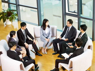 team of asian business people meeting in office