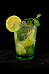 Mojito Cocktail with rum, brown sugar, lemon juice, mint and soda water