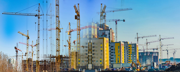 Construction of new residential buildings against the sky . The concept of the construction...