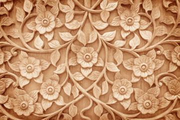 Pattern of flower carved on wood background - Powered by Adobe